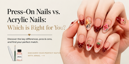 Woman wearing glossy floral red French tip press-on nails with strawberry and cherry nail art for a JRNAIL blog cover comparing press-on nails vs acrylic nails.