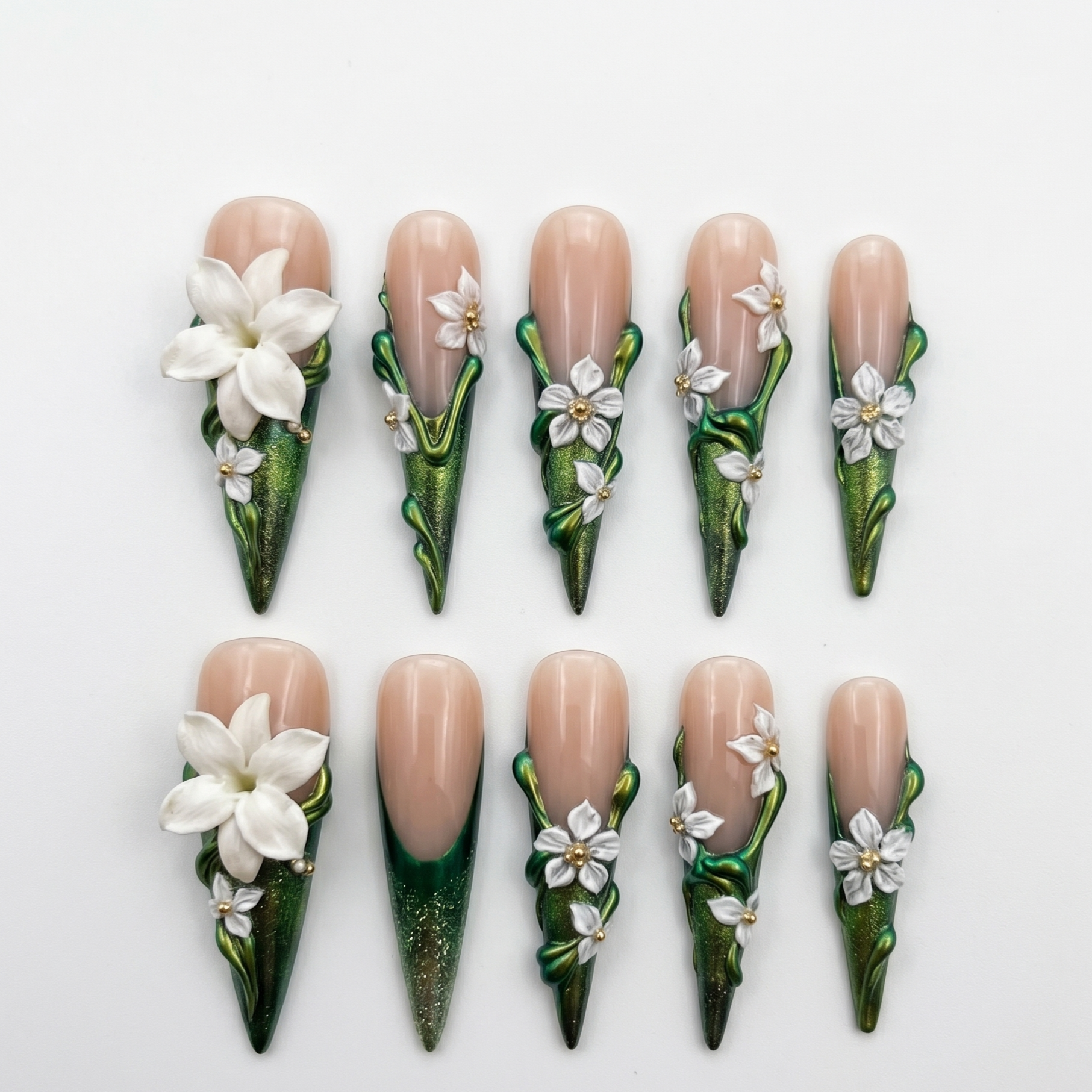 Premium stiletto-shaped press-on nails featuring high-relief 3D botanical art and metallic ivy green finishes, perfect for a statement manicure.