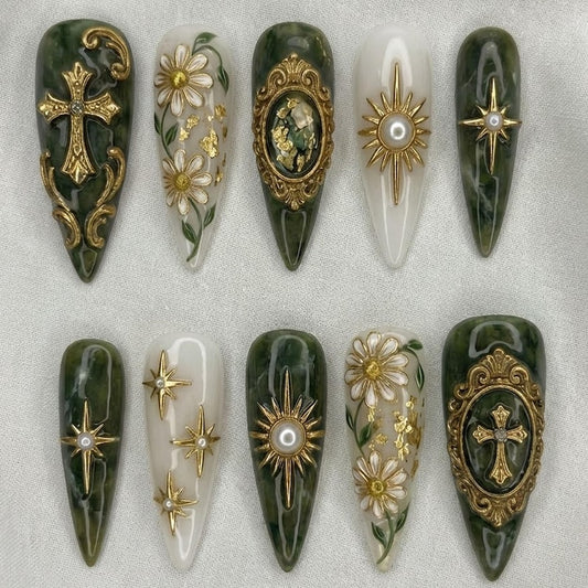 Handmade 3D floral and gold baroque press-on nails with intricate star and pearl details, perfect for a gothic glam aesthetic.