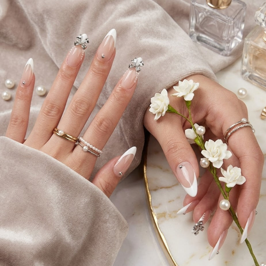 JRNAIL romantic coquette stiletto fake nails showcasing elegant bridal pearl textures and silver ribbon charms, ideal for a refined DIY wedding or special event home manicure.