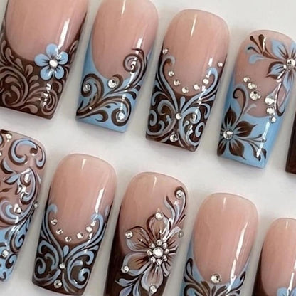 Elegant vintage-inspired press-on nails in a sophisticated brown and powder blue palette, perfect for formal occasions and classic aesthetic lovers.