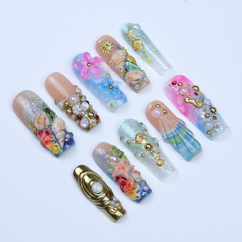 Statement long coffin press on nails with 3D ocean art, gold sun charms, and crystal accents for mermaid style