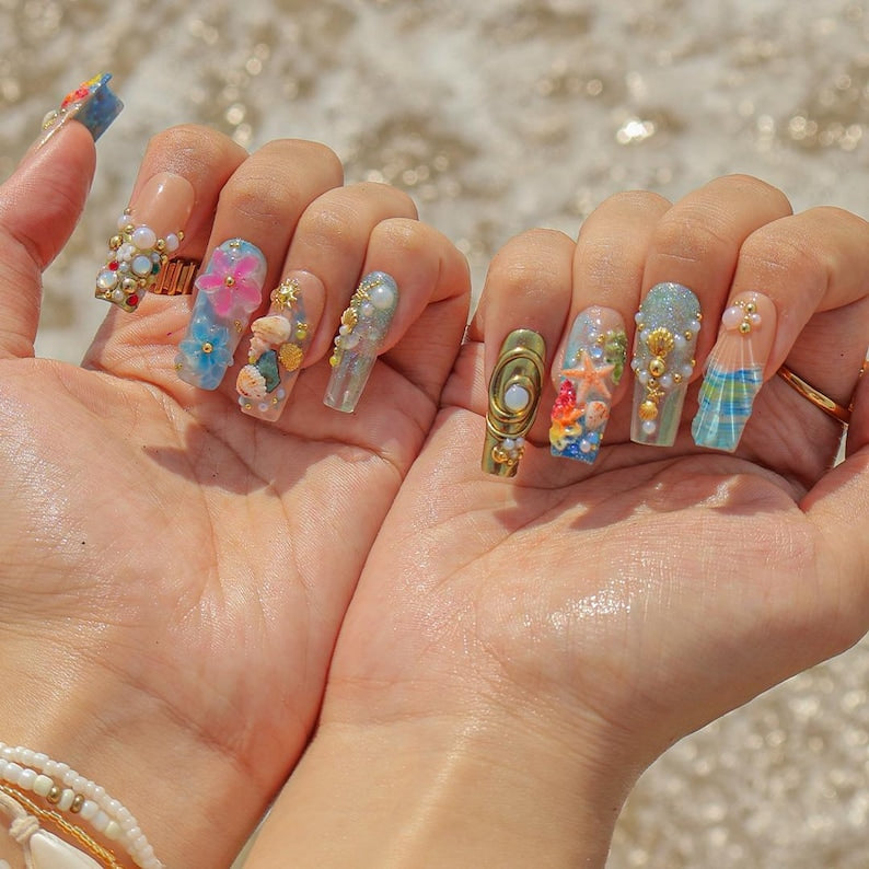 Reusable mermaid press on nails with 3D seashells, starfish, and iridescent glitter finish for summer festivals