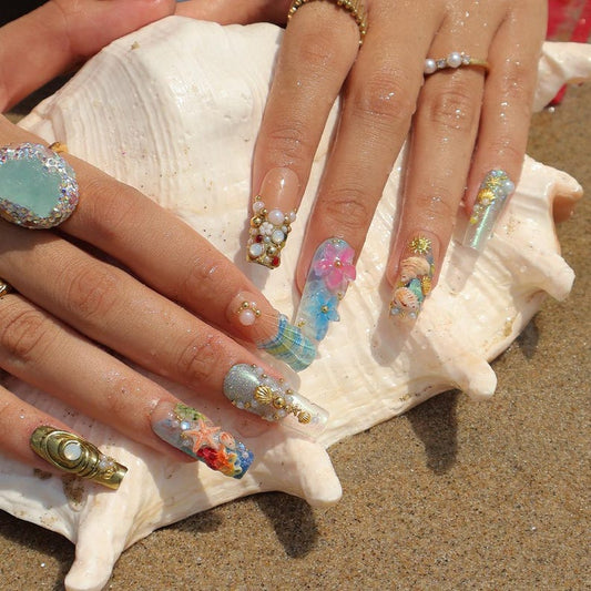 Enchanted deep sea 3D mermaid press on nails with seashells, starfish, and gold charms, iridescent ombré coffin shape