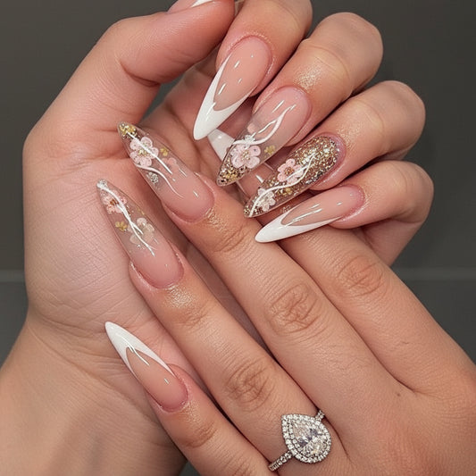 Elegant stiletto press-on nails featuring a white French tip design and delicate pressed flowers by JRNAIL.