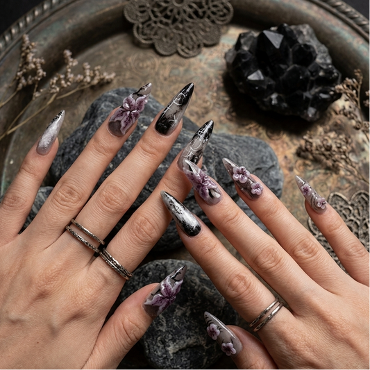 Handmade gothic style gel press-on nails with 3D purple floral and black ink art.