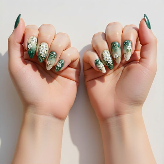 Handmade sage green to emerald ombre almond press on nails featuring 3D white flowers, gold vine detailing, teal and iridescent rhinestones on a soft white background — luxury cottagecore nail art set.