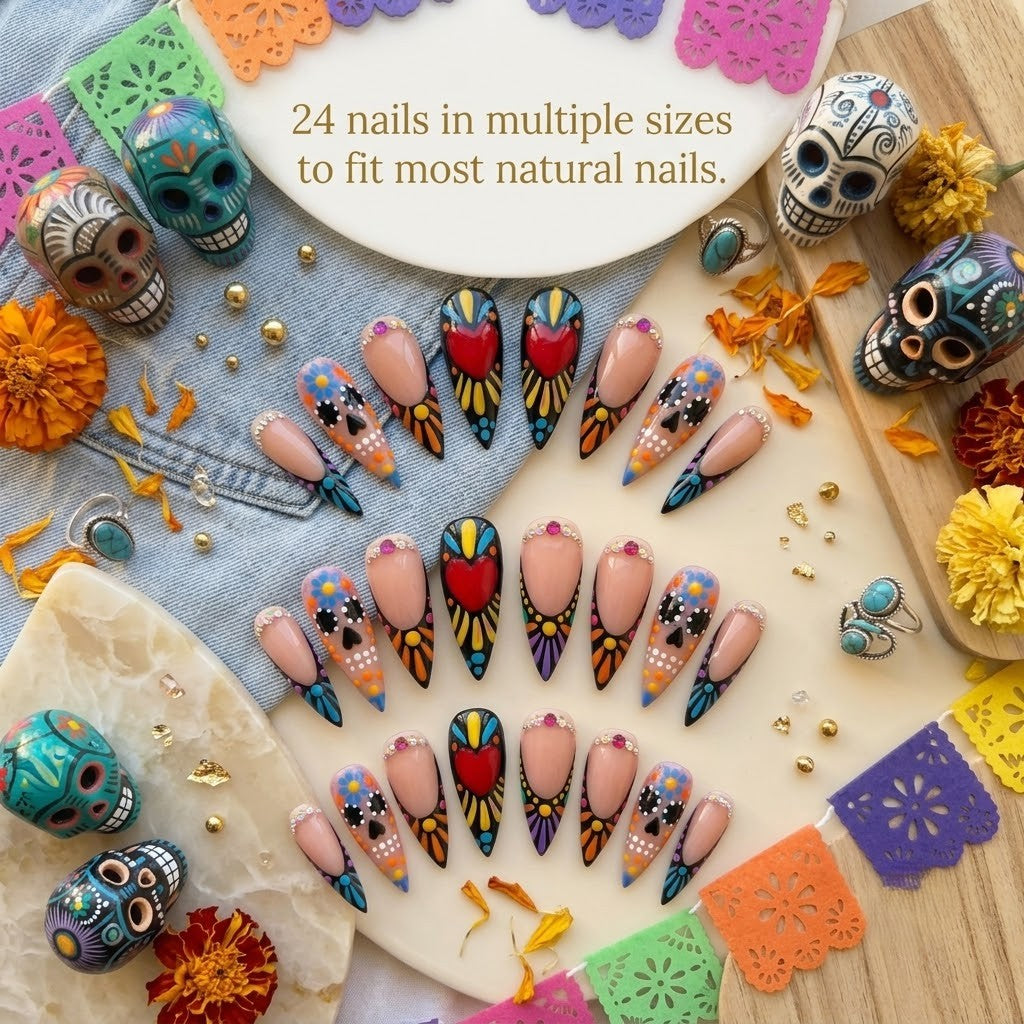 A premium 24-piece luxury press-on nail set featuring dramatic stiletto tips hand-painted with colorful sugar skulls, neon sunburst patterns, and red hearts, laid out flat amidst Day of the Dead decor, marigolds, and colorful banners with text reading '24 nails in multiple sizes to fit most natural nails.