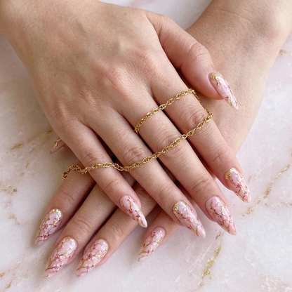 Luxury handmade cherry blossom stiletto press-on nails with pink marble and gold foil accents by JRNAIL.
