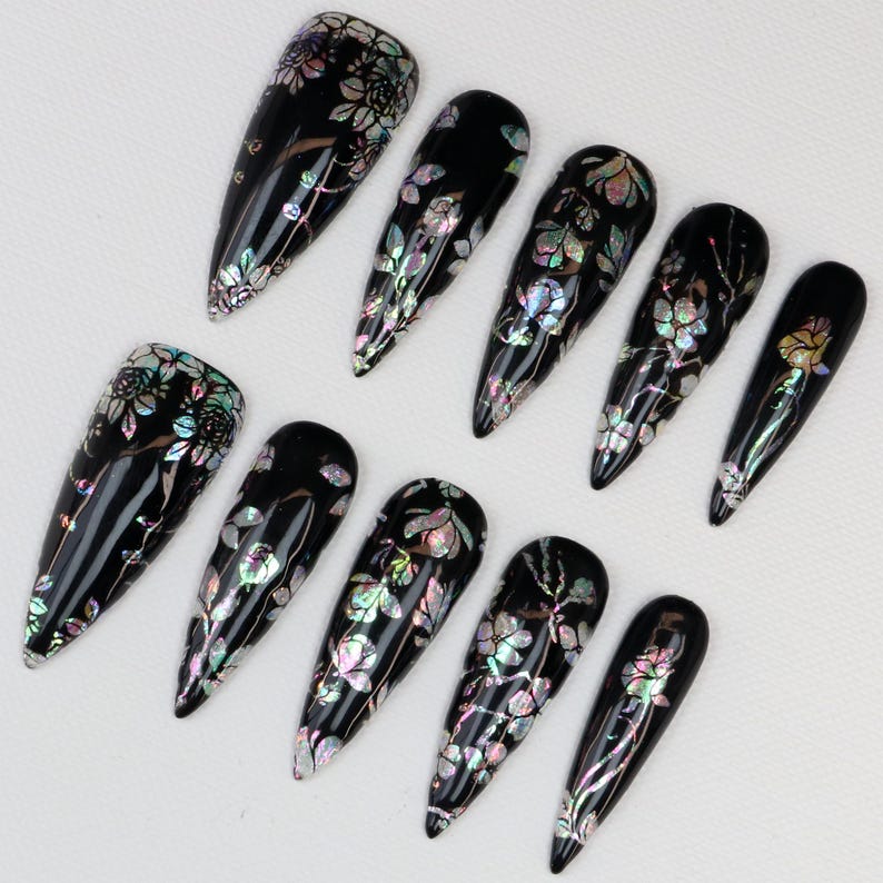 Set of 10 gothic press-on nails with iridescent botanical pattern on glossy black background