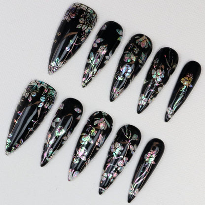 Set of 10 gothic press-on nails with iridescent botanical pattern on glossy black background