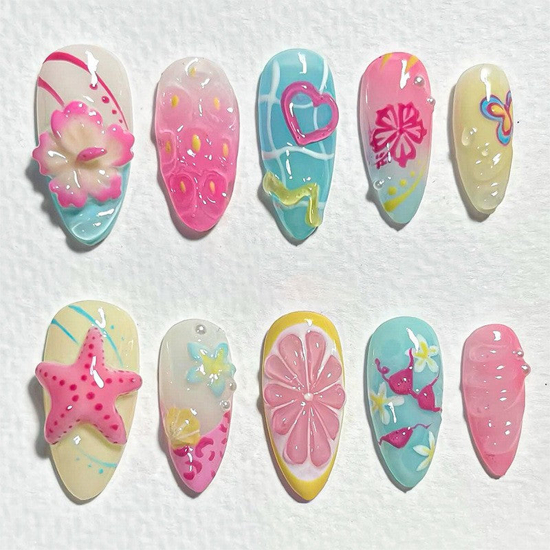 Set of colorful JRnail art designs on a white background