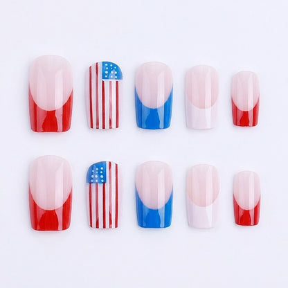 Ten square-shaped press-on nails neatly arranged in two neat rows of five on a crisp, solid white background, displaying a mix of red and blue French tips alongside American flag nail art.