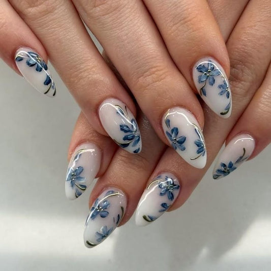 JR NAILS Blue Porcelain Floral Press On Nails on marble background