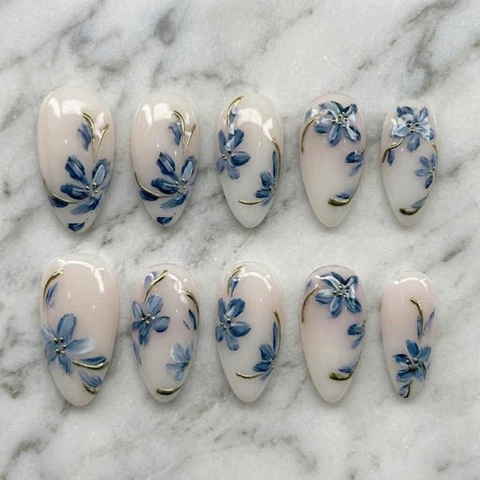 Hand-painted blue flower press on nails with gold line art