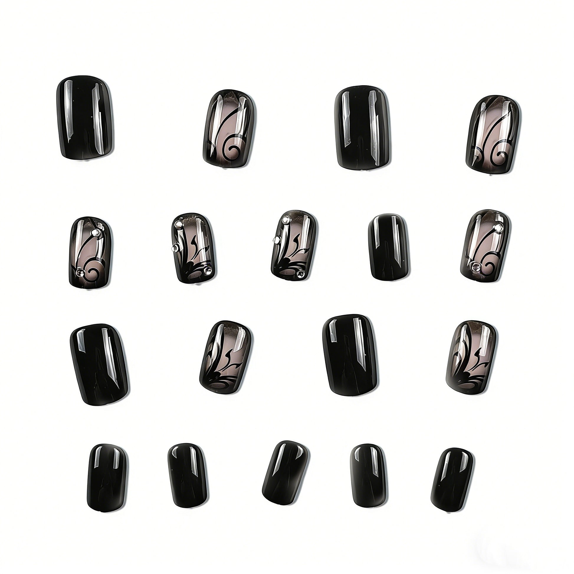 Close-up of hand wearing JRNAILS black and nude press on nails with intricate butterfly art and crystal embellishments
