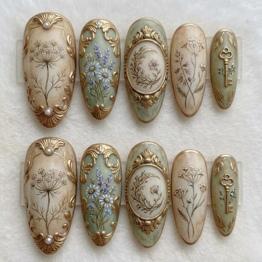 Luxury almond press on nails with botanical art and gold details
