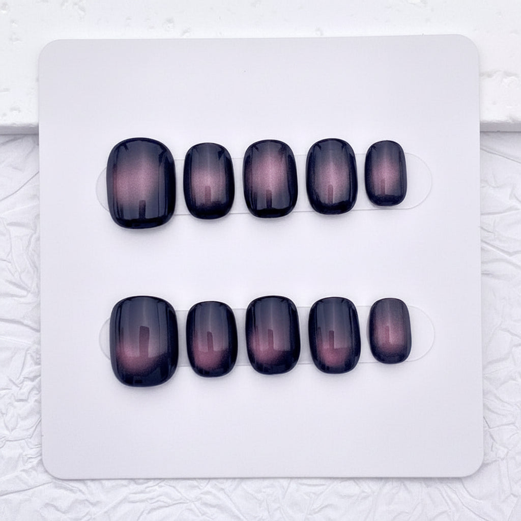 Luxurious short magnetic gel press-on nails in a rich dark plum hue, designed for a high-shine, multidimensional salon-quality manicure.