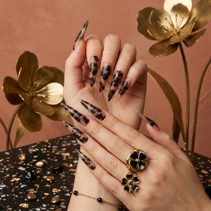 JRNAIL luxury gothic style fake nails displaying a glossy high-shine gel finish with dramatic black floral art and gold leaf details, perfect for a custom DIY home manicure.