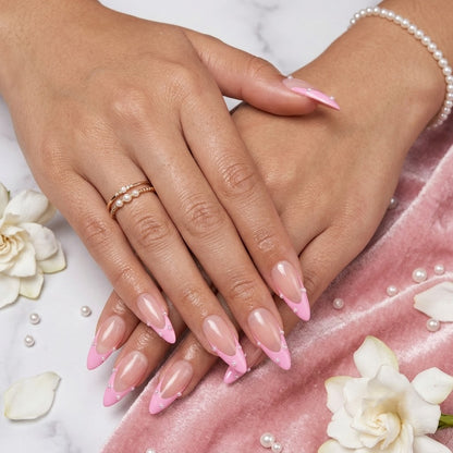 JRNAIL elegant minimalist stiletto fake nails displaying a glossy gel finish, soft pink accents, and dainty pearlescent details, ideal for a chic DIY home manicure, bridal wear, or balletcore style look.