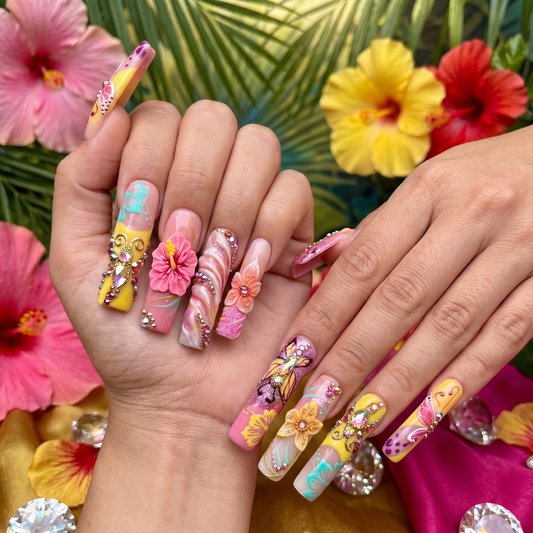 Vibrant extra-long square press-on nails featuring hand-sculpted 3D hibiscus flowers, butterfly motifs, and crystal accents by JRNAIL.