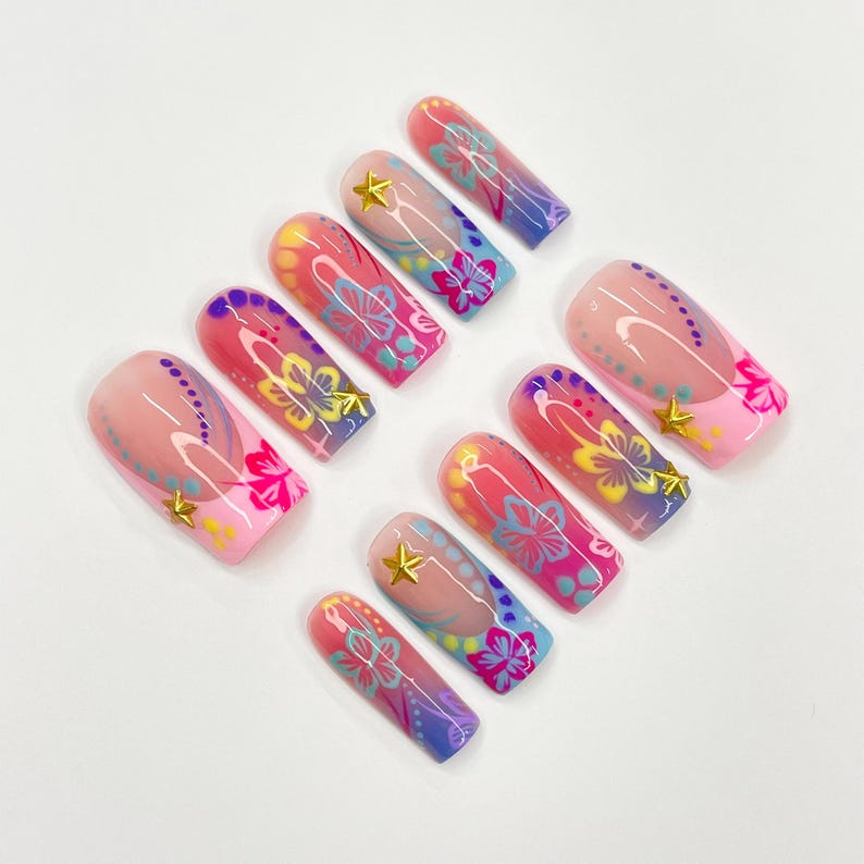 Reusable medium square press on nails with tropical boho design, gold accents, and vibrant gradient for women