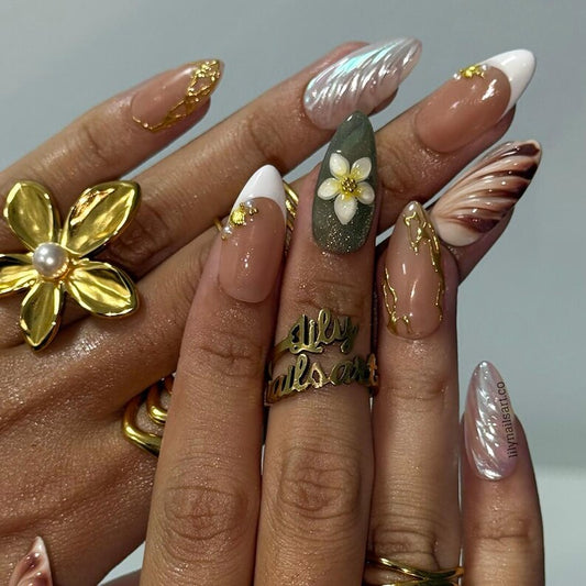 Vintage sage green plumeria press on nails with gold kintsugi line art and iridescent shell swirls