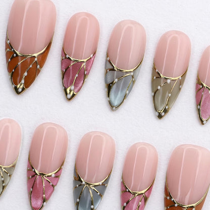 Luxury nude French tip press-on nails by JRNAIL, featuring a semi-translucent base and colorful butterfly wing details.