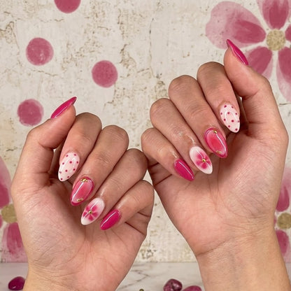 JRNAIL luxury coquette-style fake nails showcasing a glossy high-shine finish with delicate 3D floral art and gold metallic details, perfect for a custom DIY home manicure.